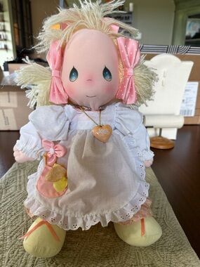 A vintage 1985 Precious Moments "Heather" cloth doll